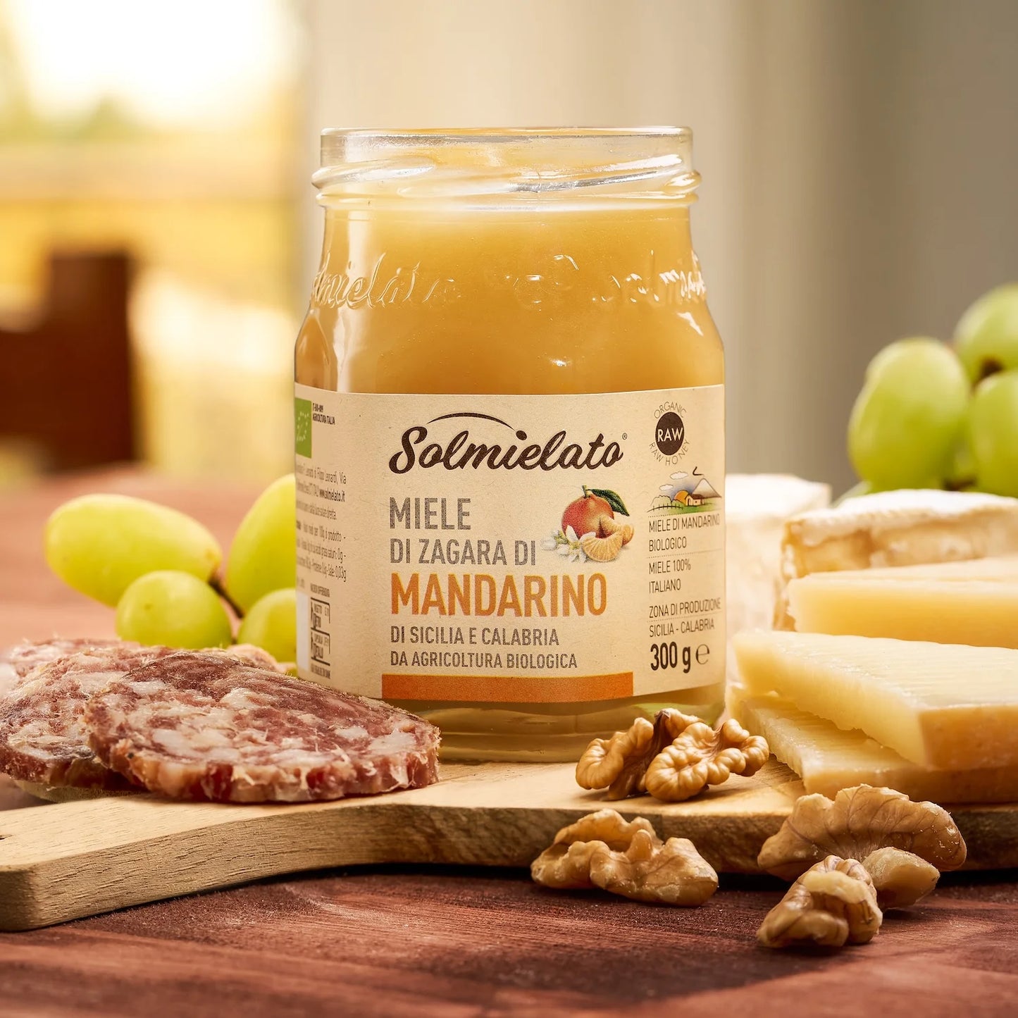 Miele di mandarino con tagliere di formaggi e salumi